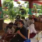 Vaksinasi Covid-19 untuk anak usia 6-11 tahun di SDN Kalibata 11, Jakarta Selatan dimulai pada Selasa (14/12/2021). (Liputan6.com/ Muhammad Radityo Priyasmoro)