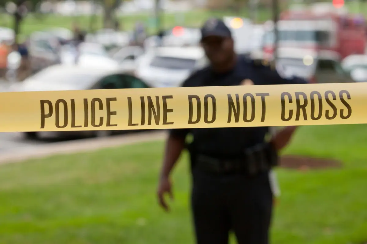 Polisi Melintasi TKP Penembakan Baltimore