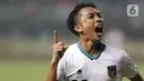 Pemain depan Timnas Indonesia U-19, Rabbani Tasnim Siddiq merayakan golnya pada laga terakhir grup A Piala AFF U-19 2022 melawan Myanmar U-19 di Stadion Patriot Candrabhaga, Bekasi, Jawa Barat, Minggu (10/7/2022). Timnas Indonesia U-19 tampil menguasai lapangan dan berhasil menundukkan Myanmar U-19 dengan skor 5-1. (Liputan6.com/Helmi Fithriansyah)