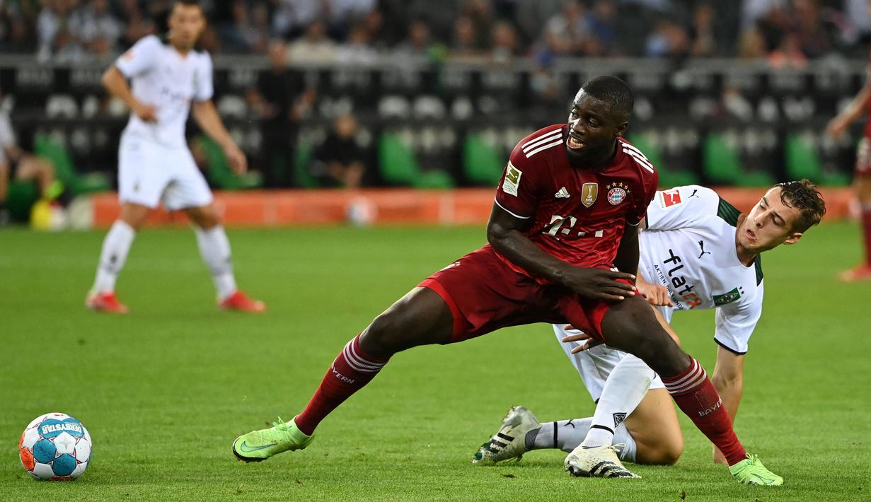 Dayot Upamecano resmi menjadi pemain Bayern Munchen pada musim ini. Sebelumnya, Bek berkebangsaan Prancis tersebut sempat mendapat tawaran bermain di Manchester United. Namun sejauh yang diketahui, mereka tidak menunjukkan pergerakan nyata untuk membawanya ke Old Trafford. (Foto: AFP/Ina Fassbender)