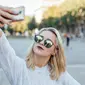 Ilustrasi selfie (iStockphoto)