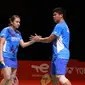 Ganda campuran Indonesia Praveen Jordan/Melati Daeva Oktavianti menang pada laga kedua Grup B BWF World Tour Finals 2021 di Bali International Convention Center, The Westin Resort, Nusa Dua, Kamis (2/12/2021). (foto: Humas PP PBSI)