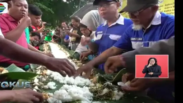 Masyarakat Solo gelar pesta rakyat untuk menyukuri lancarnya pernikahan Kahiyang dan Bobby.