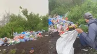 Bukit Trunyan di Bali yang sempat heboh karena tumpukan sampah. (Dok: Instagram @infodenpasarterkini.id https://www.instagram.com/p/C4nKbUIyFra/?igsh=YjFzNm80bDY1MDcz)