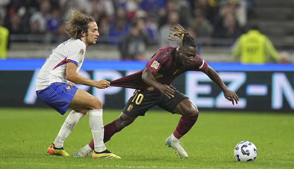 Hasil ini membawa Prancis ke peringkat kedua Grup 2 dengan tiga angka. Poin mereka sama dengan Belgia di posisi ketiga. Kedua tim tertinggal tiga angka dari Italia di puncak klasemen. (AP Photo/Laurent Cipriani)