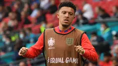 Jadon Sancho menjadi pemain anyar yang akan dinantikan penampilannya oleh fans Manchester United. Ia digadang-gadang akan menjalani debutnya kala MU melawan Leeds United pada Sabtu, 14 Agustus 2021. Sebelumnya, Ia merupakan pemain muda yang impresif di Borussia Dortmund. (Foto: AFP/Pool/Andy Rain)