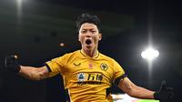 Hwang Hee-chan. Striker Wolverhampton berusia 25 tahun ini merupakan pemain pinjaman yang didatangkan dari RB Leipzig di awal musim ini. Ia total telah bermain 9 laga bagi Wolves dengan mencetak 4 gol dan 1 assist hingga membuat Manchester City dan Liverpool tertarik mendatangkannya. (AFP/Glyn Kirk)