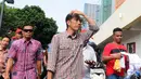 Di bawah terik matahari, Capres no urut 2 Joko Widodo menyempatkan blusukan mengelilingi sebuah pusat perbelanjaan di Depok Jawa Barat, (4/7/2014). (Liputan6.com/Andrian M Tunay)