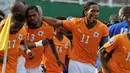 Ivorian National football team's striker Didier Drogba celebrates with teammate victory against Malawi on March 29, 2009 at Felix Houphouet-Boigny stadium in Abidjan during their World Cup 2010 qualification match. AFP PHOTO / ISSOUF SANOGO 