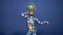 Seorang model berpose selama sesi pemotretan untuk Daegu International Bodypainting Festival 2017 di Korea Selatan, (26/8). Para model bertransformasi menjadi bentuk seni yang nyata dan hidup ketika tubuh mereka telah selesai dilukis. (Ed JONES / AFP)