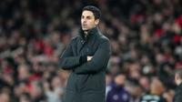 Manajer Arsenal, Mikel Arteta, berdiri di tepi lapangan saat pertandingan Liga Inggris melawan Manchester United di Emirates Stadium, Minggu (25/1/2026). (AP Photo/Kirsty Wigglesworth)