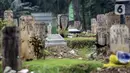 Sejumlah makam di Srengseng Sawah, Jakarta, Selasa (15/6/2021). Kasus COVID-19 pascamudik dan libur Lebaran 2021 terus melonjak, bahkan Jakarta saat ini memasuki fase yang amat genting karena adanya lonjakan drastis kasus COVID-19.(Liputan6.com/Johan Tallo)