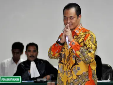 Muhtar Ependy mengikuti sidang perdana di Pengadilan Tipikor, Jakarta, Kamis (20/11/2014). (Liputan6.com/Miftahul Hayat)
