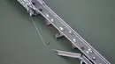 Gambar udara ini menunjukkan jembatan yang sebagian runtuh setelah gempa bumi di Yatsushiro, Prefektur Kumamoto, pada hari Selasa, 28 Juli 2026. (Kyodo News via AP)