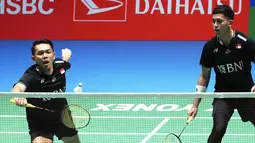 Fajar/Rian kalah dua game langsung dari pasangan Chinese Taipei tersebut. (Photo by Toshifumi KITAMURA / AFP)