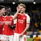 Wajah gembira para pemain Arsenal merayakan gol yang dicetak Martin Odegaard ke gawang Wolverhampton dalam lanjutan Liga Inggris 2023/2024, Minggu (21/4/2024) dini hari WIB. ((Nick Potts/PA via AP)