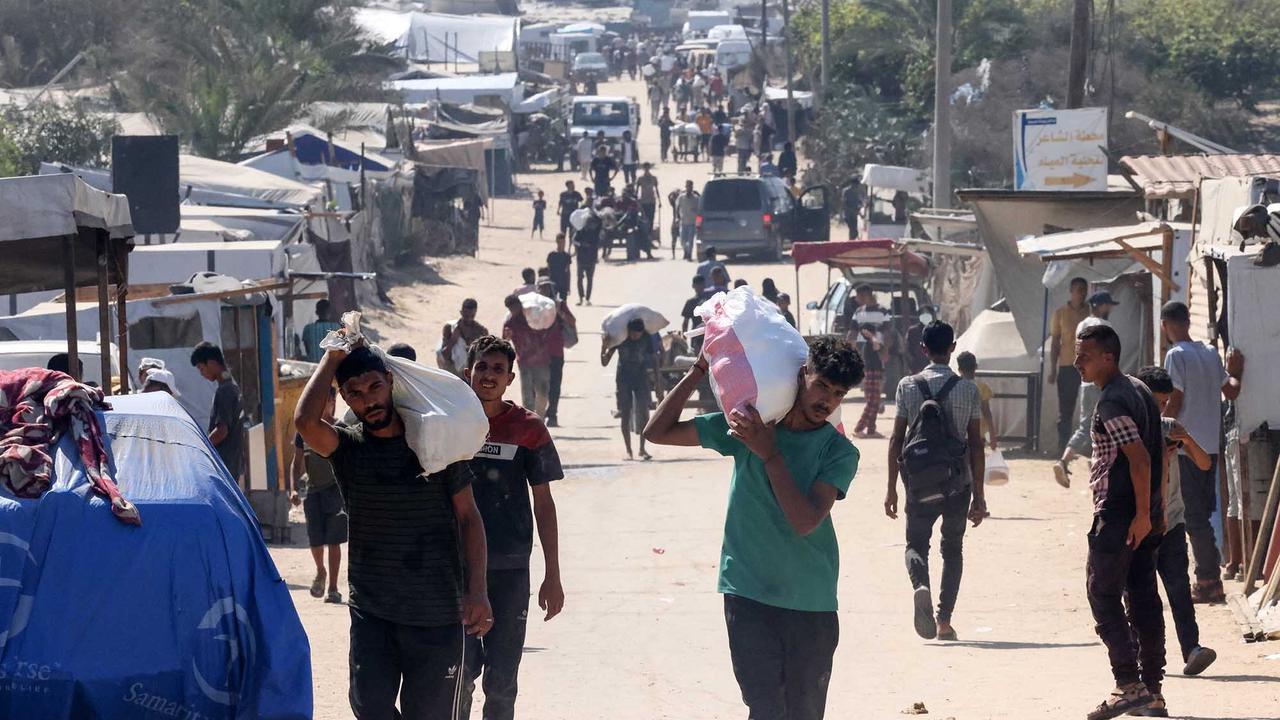 FOTO:  Israel Umumkan Jeda Taktis, Truk Bantuan Mulai Masuk Gaza