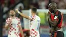 <p>Reaksi kecewa pemain Belgia,&nbsp;Romelu Lukaku setelah gagal mengantarkan timnya melaju ke babak 16 besar saat matchday ketiga Grup F Piala Dunia 2022 melawan Kroasia di Ahmad Bin Ali Stadium, Kamis (01/12/2022). (AP/Francisco Seco)</p>