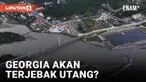 Sebuah konsorsium Tiongkok belum lama ini memenangkan kontrak untuk membangun pelabuhan laut dalam di pantai Laut Hitam di Georgia. Namun analis cemas Georgia akan terjebak utang dan pemerintah membahayakan perekonomian dan demokrasi negara ini karen...