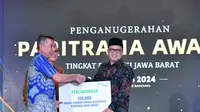 Penganugerahan Jaminan Sosial Ketenagakerjaan PARITRANA AWARD Provinsi Jawa Barat di Aula Barat Gedung Sate, Kota Bandung, Sabtu (24/8/2024).(sumber foto: Biro Adpim Jabar)