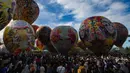 Suasana meriah mewarnai Festival Balon Wonosobo 2025 di Lapangan Wringinanom, Wonosobo , Jawa Tengah, Sabtu (5/4/2025). (merdeka.com/Arie Basuki)