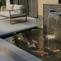 Ilustrasi Kolam Ikan Mini Air Terjun di Teras Rumah/Gemini AI