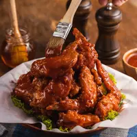 Ilustrasi sayap ayam pedas/copyright freepik.com/wirestock