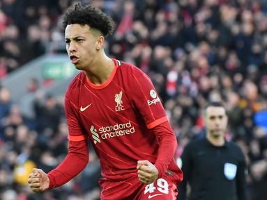 Kaide Gordon melakukan debutnya di Liverpool pada 21 September 2021 kala melawan Norwich City. Saat itu, ia tengah berumur 16 tahun 11 bulan dan 16 hari. Gordon tampil cemerlang dengan mencetak gol dan tercatat sebagai pencetak gol termuda kedua dalam sejarah The Reds. (AFP/Paul Ellis)