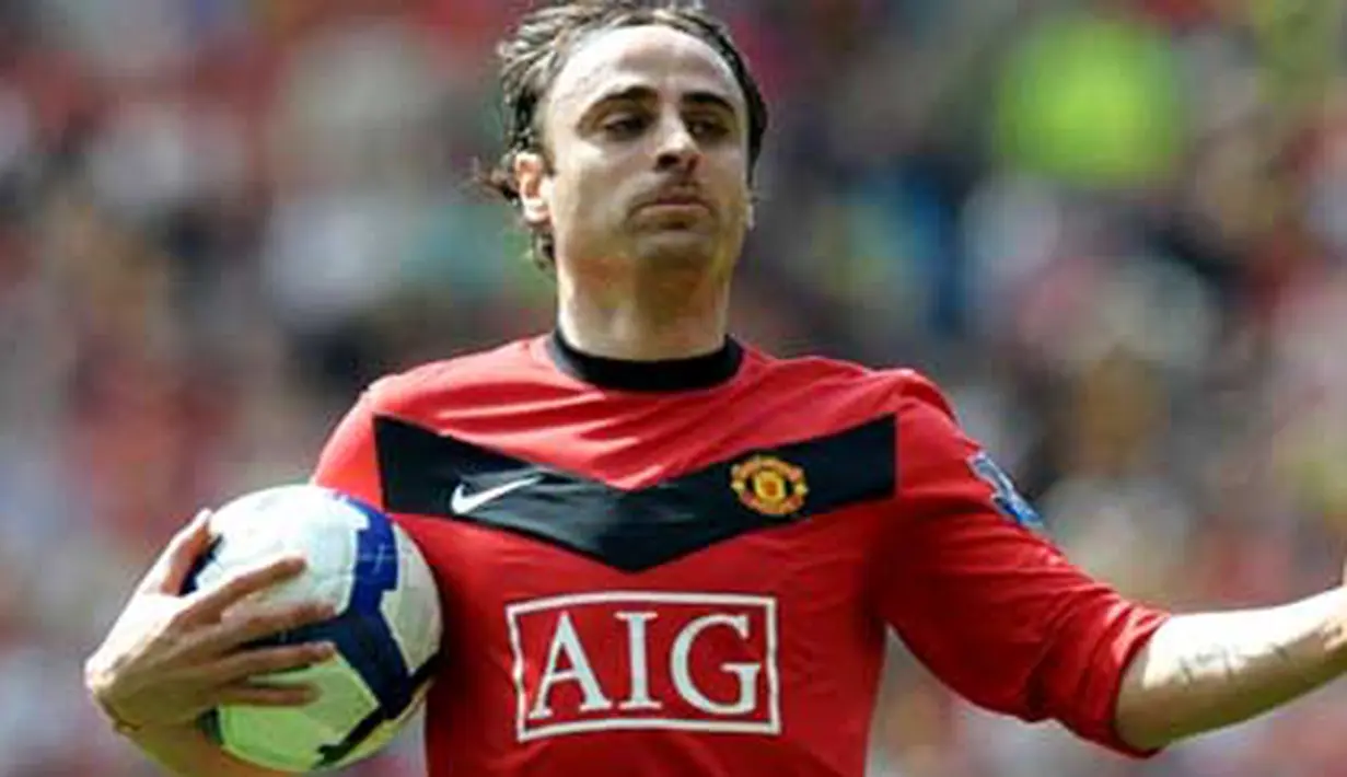 Raut kekecewaan striker Manchester United Dimitar Berbatov di laga lawan Tottenham Hotspur yang berlangsung di Old Trafford, 24 April 2010. MU menang 3-1. AFP PHOTO / PAUL ELLIS 