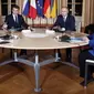 (Kiri ke kanan) - Volodymyr Zelensky dari Ukraina, Emmanuel Macron dari Prancis, Vladimir Putin dari Rusia dan Angela Merkel dari Jerman di Elysee Palace di Paris. (Liputan6/BBC/EPA)