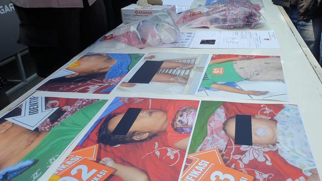 Beberapa foto hasil olah TKP menunjukan para korban dalam dugaan perkara bunuh diri ibu dan 2 anaknya di perum Jati Asri  Cibunar, Garut, Jawa Barat.