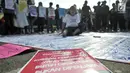Massa menggelar aksi menuntut keadilan untuk WA, Jakarta, Minggu (5/8). Massa menuntut dicabutnya putusan bersalah WA, rehabilitasi nama korban, dan wujudkan UU penghapusan kekerasan seksual yang berpihak pada korban. (Merdeka.com/Iqbal S. Nugroho)