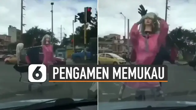 Aksi unik, lucu dan kompak diperlihatkan oleh seorang pengamen pria ini ketika beraksi di lampu merah.