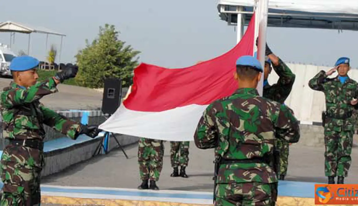 Citizen6, Kongo: Pengibaran bendera merah putih di di Lapangan Parade Soekarno, Lebanon Selatan, Senin pagi (18/4) waktu Lebanon. (Pengirim: Badarudin Bakri Badar)