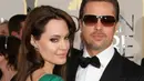 Brad Pitt merasa Angelina Jolie seharusnya bicara dulu dengannya jika ingin mengajak Pax ke acara orang dewasa seperti Golden Globes. (VALERIE MACON / AFP)