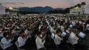 Musisi dari National System of Orchestras of Venezuela berusaha memecahkan rekor dunia bermain orkestra terbesar di dunia, di Akademi Militer Angkatan Darat Bolivarian di Caracas pada 13 November 2021. Sekitar 12 ribu musisi tersebut menyuguhkan pertunjukan selama 12 menit. (Federico PARRA/AFP)