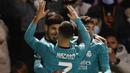 Real Madrid tak butuh lama untuk kembali memimpin pertandingan. Pada menit ke-76, Marco Asensio sukses menjebol gawang Deportivo Alcoyano lewat tendangan kerasnya. (AP/Jose Breton)