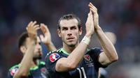 Ekspresi Gareth Bale usai menjalani laga Semi Final Piala Eropa 2016 di Parc Olympique Lyonnais, Perancis, Kamis (7/7). Portugal menang atas Wales dengan skor akhir 2-0. (REUTERS)