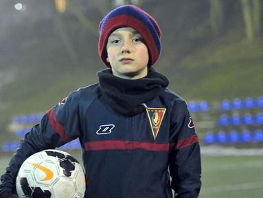 Jacek Czaplinski merupakan pesepak bola 11 tahun yang menjadi incaran dari Real Madrid. Pesepak bola Polandia tersebut kini berlatih bersama Pogon Szczecin Football Academy. (EPA/Marcin Bielecki)