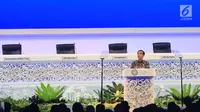 Presiden Joko Widodo menyampaikan sambutan pada Pertemuan Tahunan IMF-WB Group 2018, Bali, Jumat (12/10). Dalam pidatonya, Jokowi mengumpamakan kondisi ekonomi global sekarang seperti cerita serial televisi Game of Thrones. (Liputan6.com/Angga Yuniar)