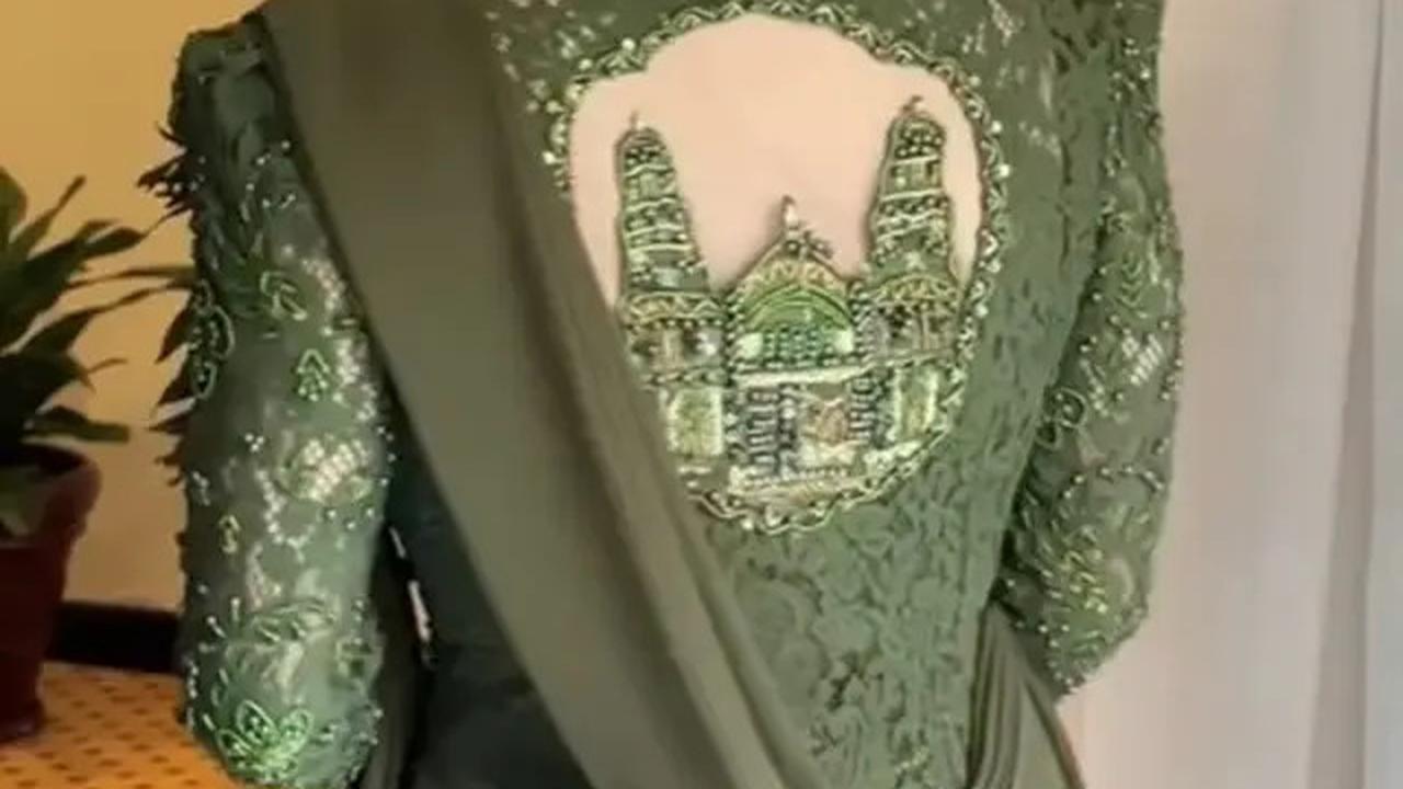 6 Detail Penampilan Dewi Perssik Pakai Kebaya Hijau Zamrud di HUT TNI, Memukau