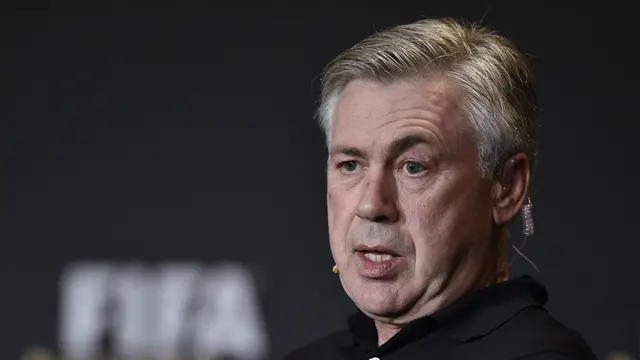 Carlo Ancelotti memberikan dukungan kepada tim nasional Prancis untuk menjadi juara di Piala Eropa 2016 (AFP PHOTO / FABRICE COFFRINI)