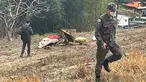 Puing-puing pesawat latih KT-1 Angkatan Udara Korea Selatan terlihat di sebuah lapangan di Sacheon, Korea Selatan, Jumat (1/4/2022). Dua pesawat angkatan udara Korea Selatan bertabrakan di udara selama pelatihan dan jatuh di dekat pangkalan mereka, menewaskan empat pilot. (Kim Dong-min/Yonhap via AP