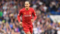 Virgil van Dijk - Bergabung dengan Liverpool pada Januari 2018, van Dijk langsung memberikan kontribusi yang sangat besar bagi lini pertahanan The Reds. Pemain asal Belanda ini menjadi tembok pertahanan yang kokoh Liverpool. (AFP/Olly Greenwood)