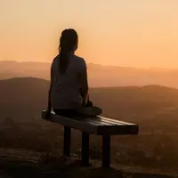 Ilustrasi Seorang Perempuan sedang Melakukan Meditasi (Unsplash/Sage Friedman)