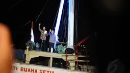 Joko Widodo didampingi Jusuf Kalla saat menyampaikan pidato kemenangan di atas kapal dengan panjang 20 meter dengan kapasitas 1.000 ton, Jakarta, Selasa (22/7/14). (Istimewa)