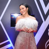 Penyanyi Yura Yunita saat menghadiri Anugerah Musik Indonesia (AMI) 2019 di MNC Studios, Kebon Jeruk, Jakarta Barat, Rabu (27/11/2019). (Adrian Putra/Fimela.com)