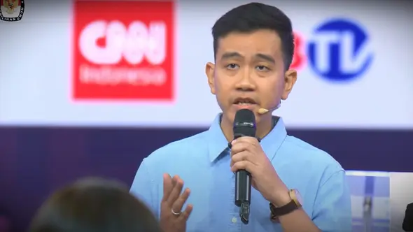 <p>Calon Wakil Presiden Gibran Rakabuming Raka di arena debat cawapres perdana di JCC Senayan, Jakarta, Jumat (22/12/2023). (Foto: Tangkapan layar dari Youtube KPU).</p>