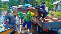 Menengok Perjuangan Bonek Kirim Bantuan ke Korban Banjir Sentani   