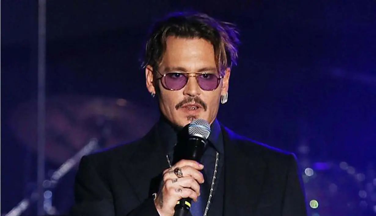 Menurut Amber, Johnny menunda-nunda proses cerainya sebagai bentuk balas dendam dan hukuman terhadap Amber. (AFP/Bintang.com)